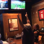 Auburn Fan Celebrates Win Over Ole Miss at Tuscaloosa Buffalo Wild Wings