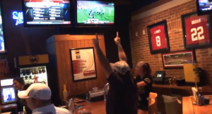 Auburn Fan Celebrates Win Over Ole Miss at Tuscaloosa Buffalo Wild Wings